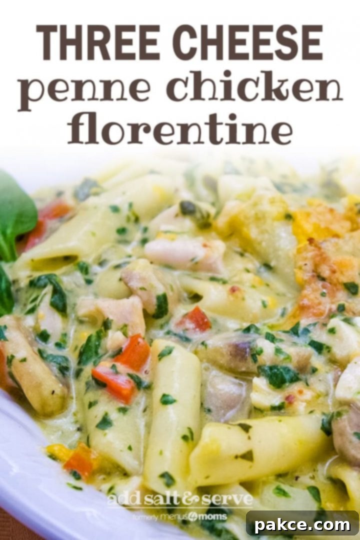 Penne pasta with mushrooms, diced red bell pepper, chopped spinach, and cubed chicken in a cream of chicken sauce, topped with shredded cheddar cheese and garnished with two baby spinach leaves on a white plate. Text three cheese penne chicken florentine add salt & serve formerly menu4moms