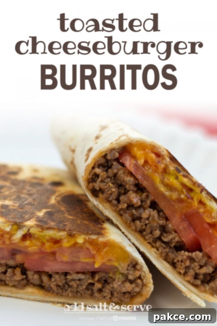 A burrito with ground beef, tomato slices, and melted cheese, cut in half on a white plate. Text toasted cheeseburger burritos add salt & serve formerly menus4moms for easy pinning.