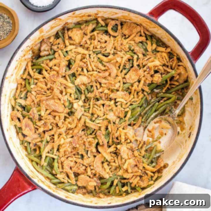 Homemade Fresh Green Bean Casserole in a skillet, ready to serve for a holiday meal.