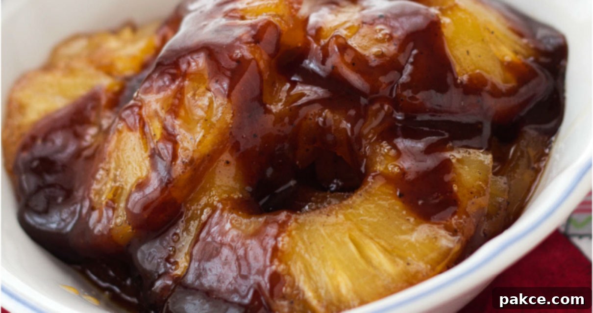Effortless 3-Ingredient Caramelized Pineapple 6 Caramelized pineapple rings in a white bowl.
