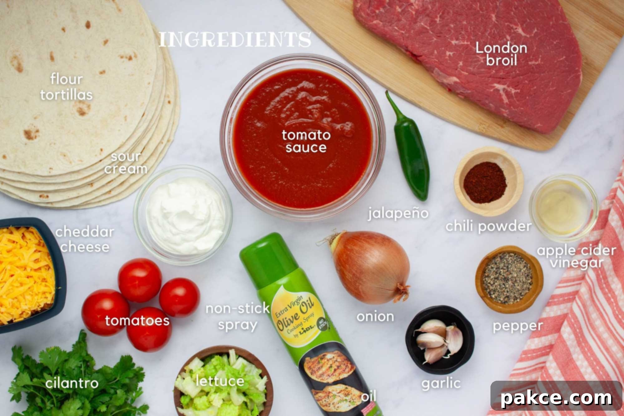 Slow Cooker Shredded Beef Burritos 3 Ingredients for beef burritos: flour tortillas, tomato sauce, jalapeño, cheddar cheese, sour cream, tomatoes, cilantro, lettuce, onion, garlic, pepper, chili powder, apple cider vinegar, London Broil, and non-stick spray.