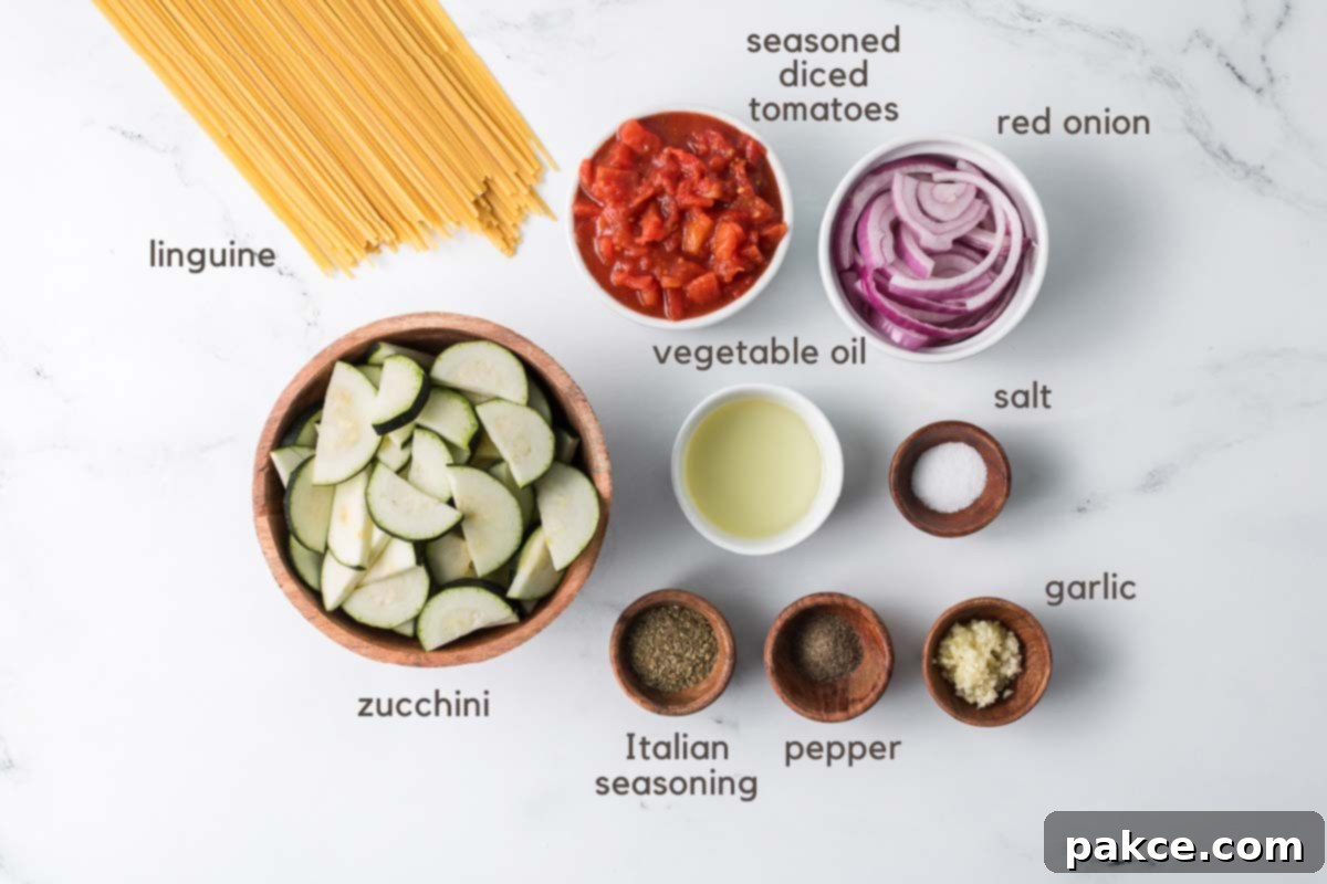 Spiralized Zucchini Linguine 3 Ingredients for zucchini linguine in prep bowls.