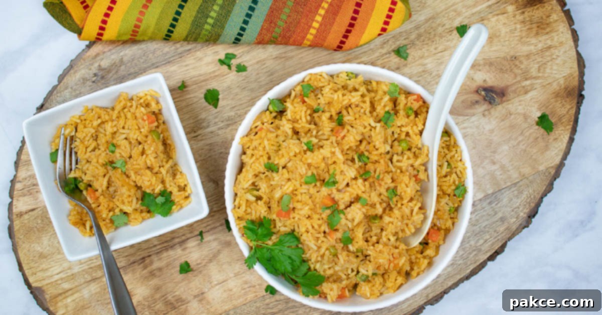 Vibrant Mexican Veggie Rice 9 Two bowls of Restaurant Style Mexican Rice, with a vibrant, appealing presentation