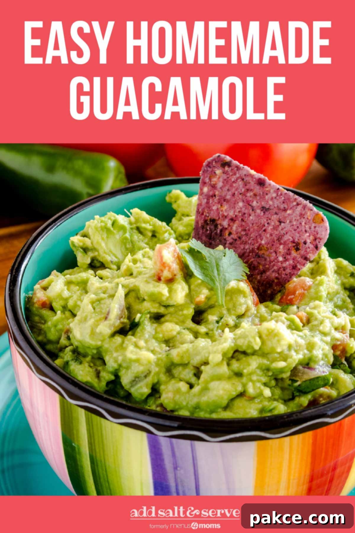 Effortless Homemade Guacamole Guide 7 Homemade guacamole in a rainbow-striped bowl, with half an avocado in the background.