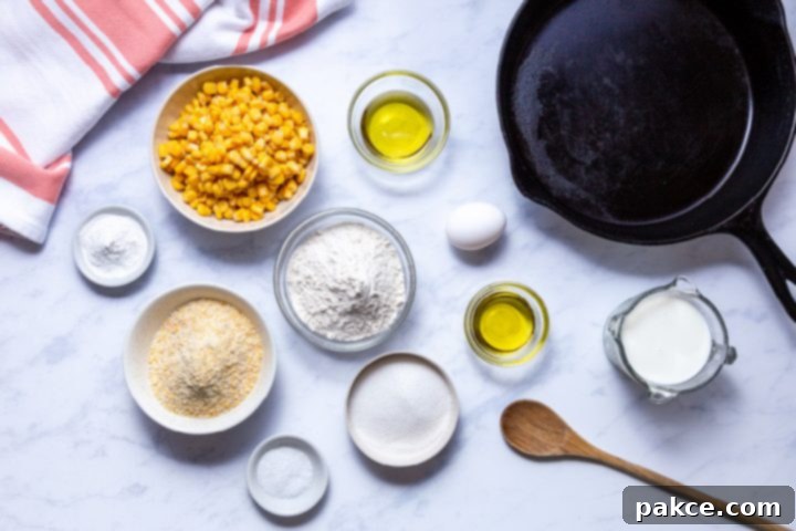 Simple Sweet Corn Cornbread 3 cast iron skillet and ingredients for cornbread with corn kernels