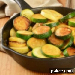 Simple Sautéed Summer Squash and Zucchini 2 Sautéed yellow squash and zucchini in a cast iron skillet.