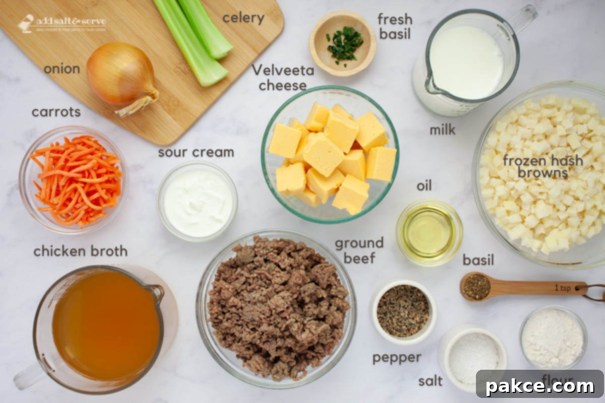 Slow Cooker Cheeseburger Comfort 3 Ingredients for Cheeseburger Soup: onion, celery, shredded carrots, chicken broth, ground, beef, sour cream, Velveeta cheese, fresh basiil strips, milk, oil, frozen hash browns, cooking oil, dried basil, flour, salt, and pepper.