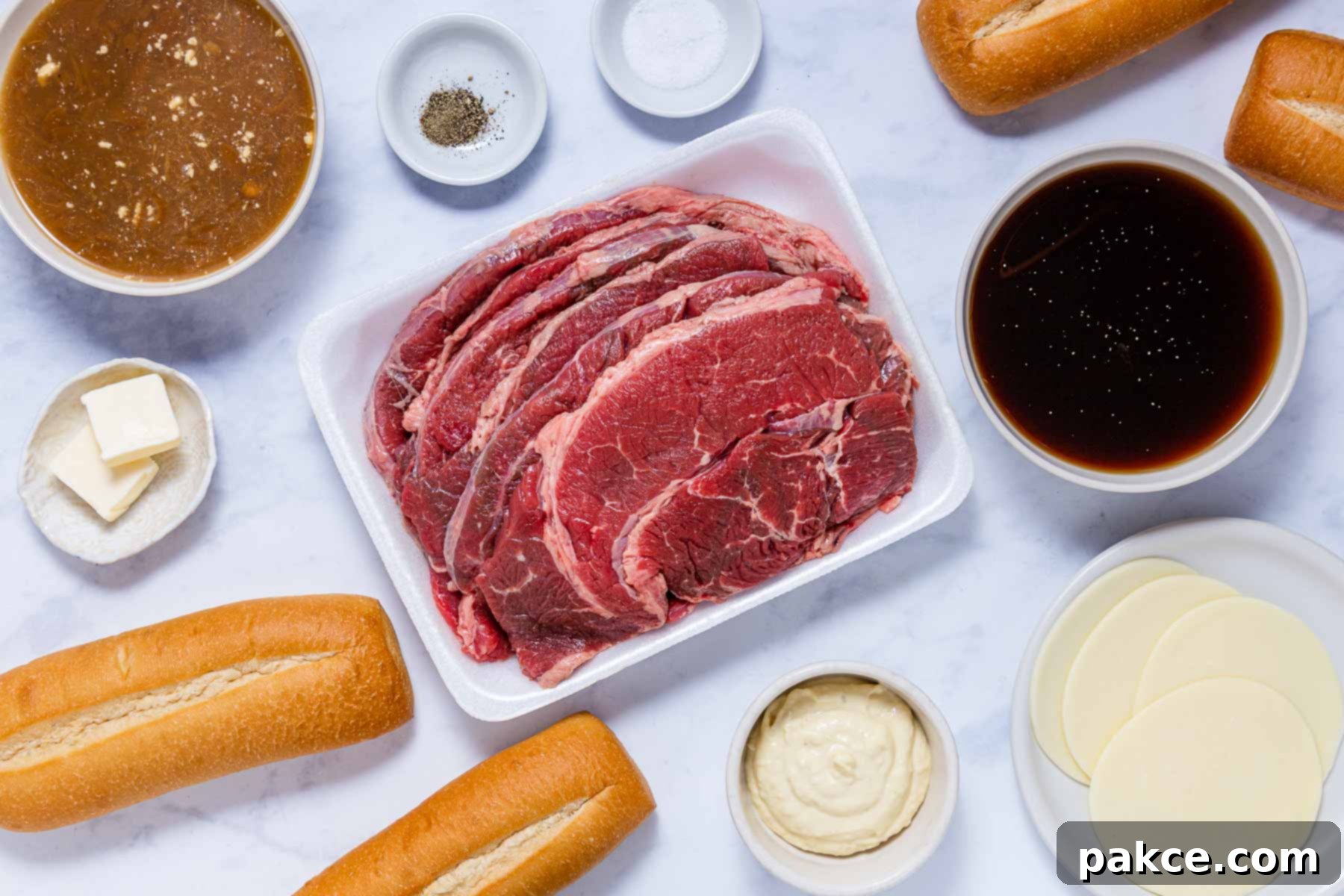 Easy Juicy Crockpot French Dip Sandwiches with Au Jus 3 Ingredients for French Dip Sandwiches: French onion soup, beef consommé, hoagie rolls, salt, pepper, mayonnaise, provolone cheese, butter, and sliced chuck roast.
