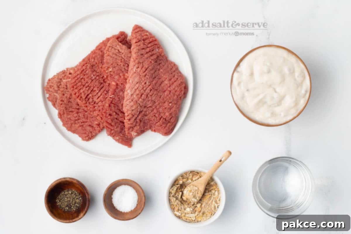 Slow Cooker Creamy Mushroom Cube Steak 3 Ingredients for crock pot cube steak and mushroom soup: cube steak, Lipton soup mix, condensed cream of mushroom soup, salt, pepper, and water.