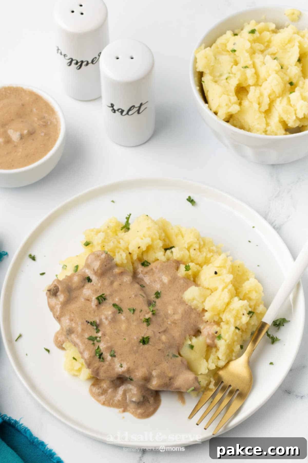 Slow Cooker Creamy Mushroom Cube Steak 7 Cube steak with mushroom soup gravy served over mashed potatoes.