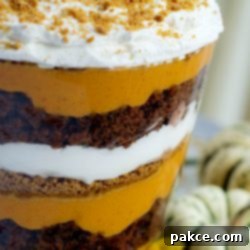 Harvest Pumpkin Dream 2 Image of layers of pumpkin filling, crushed gingersnaps, crumbled gingerbread, and whipped cream in a trifle bowl