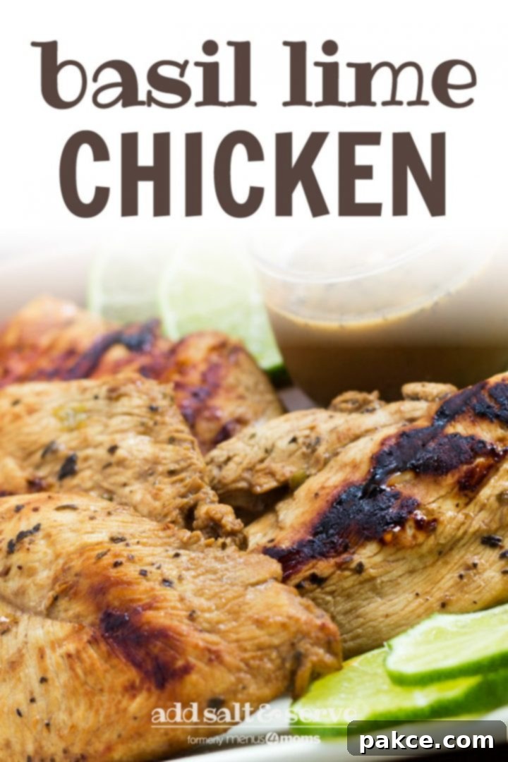 Grilled chicken on a square plate, garnished with lime slices. A small clear glass cup of Dijon basil lime dipping sauce is on the plate. Text Basil Lime Chicken add salt & serve formerly menus4moms