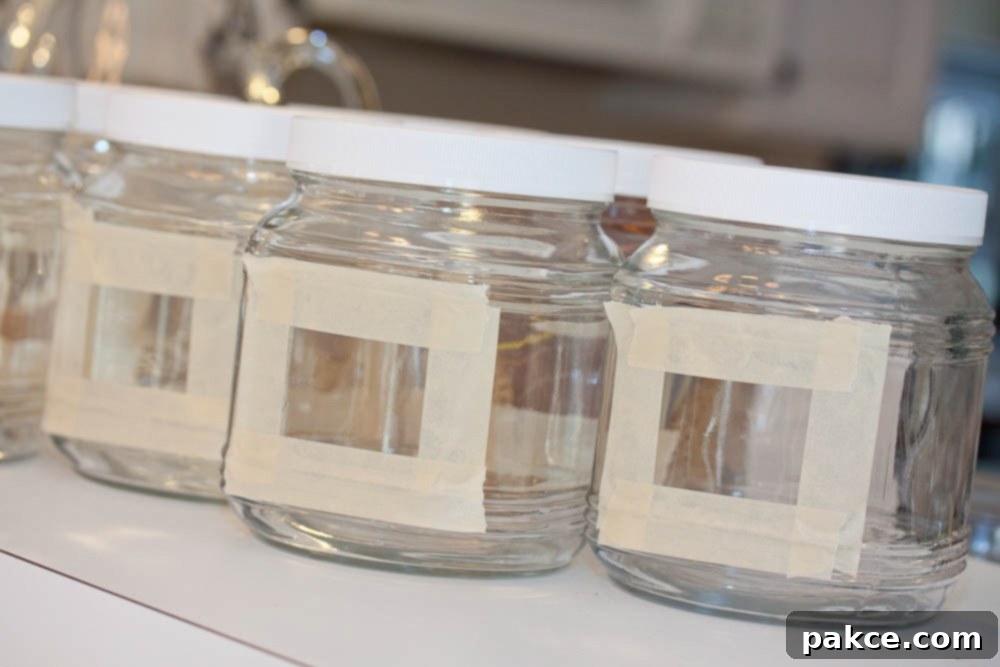 glass jars with a rectangle outlined in masking tape