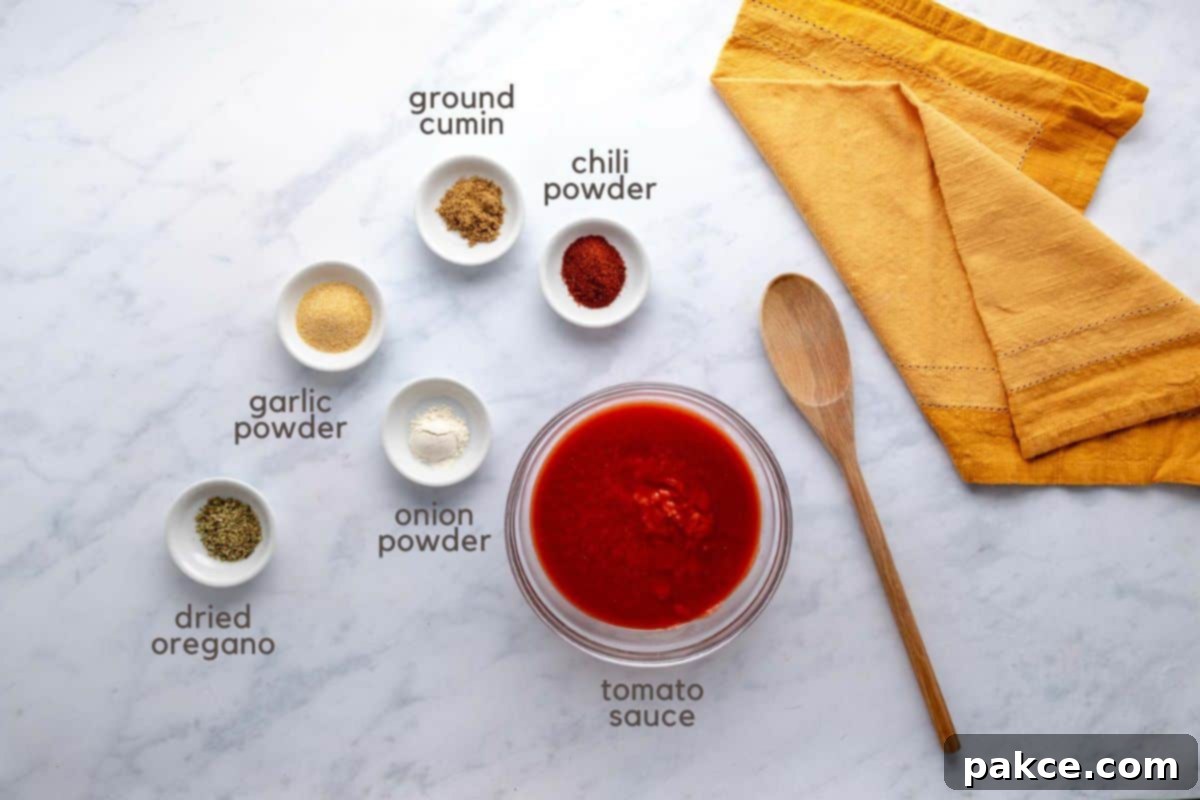Simple Scratch-Made Enchilada Sauce 2 Ingredients for homemade red enchilada sauce: tomato sauce, chili powder, ground cumin, onion powder, garlic powder, and dried oregano.