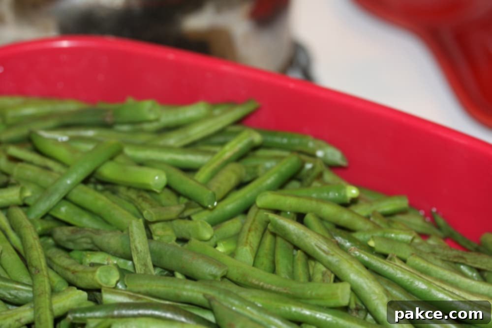 Green Beans Seasoned with Italian Dressing washed and trimmed green beans in a steamer