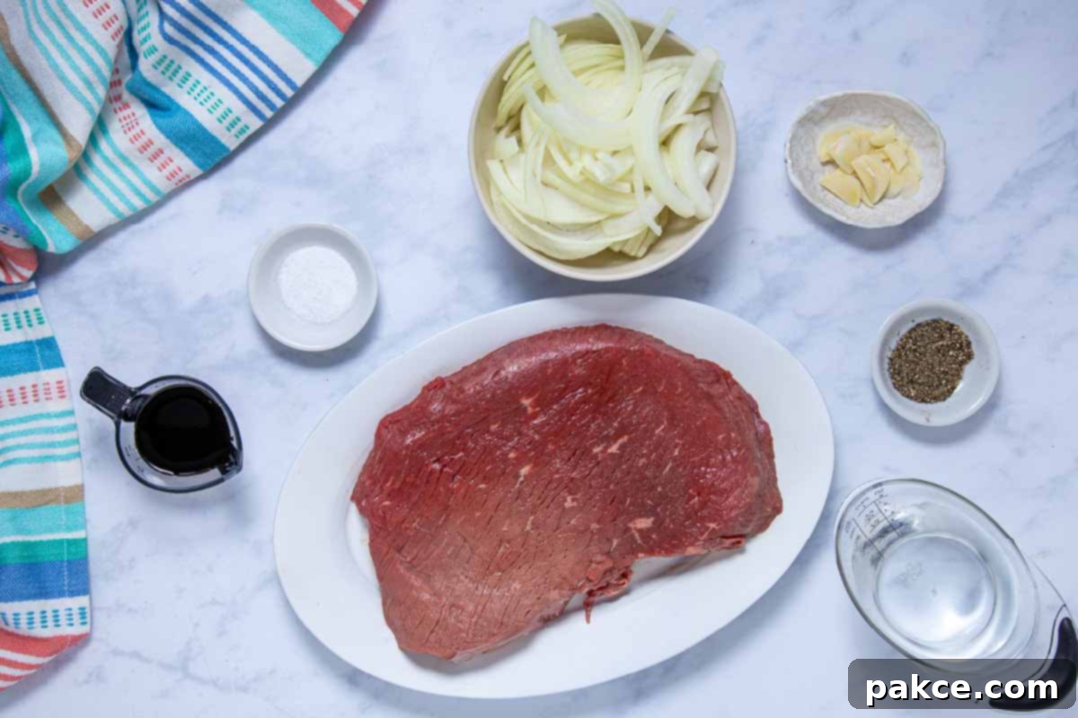 Tender Crockpot London Broil Au Jus 3 Ingredients for crock pot London Broil with au jus: London Broil roast, water, salt, pepper, sliced yellow onions, fresh garlic cloves, and soy sauce.