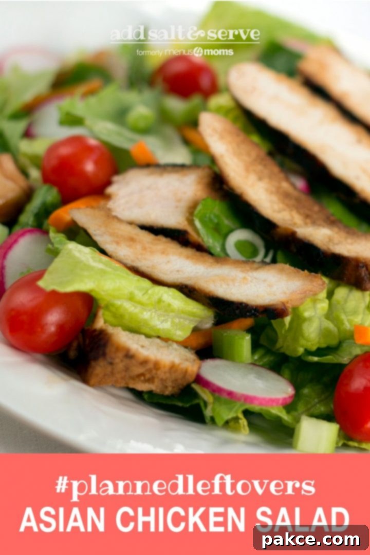 Salad of romaine lettuce pieces, grape tomatoes, and carrots topped with sliced grilled chicken and text Asian Chicken Salad #plannedleftovers Add Salt & Serve