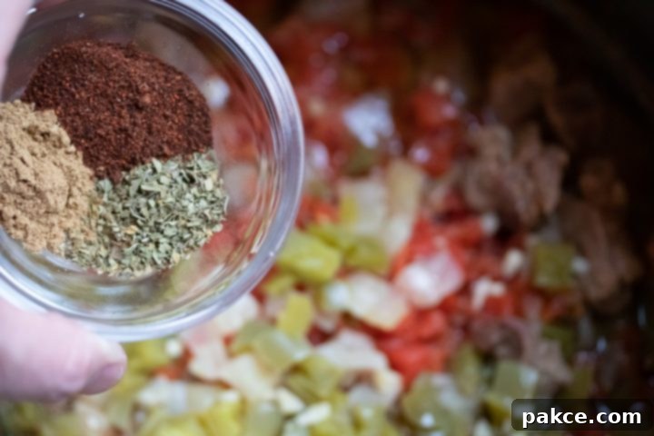 Carne Guisada: Add chili powder, oregano, and cumin to cooked beef