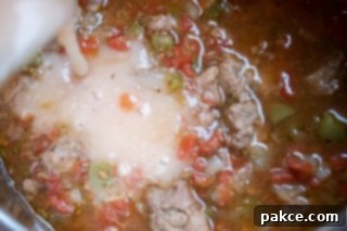Carne Guisada: Add thickened juices to meat and stir to blend