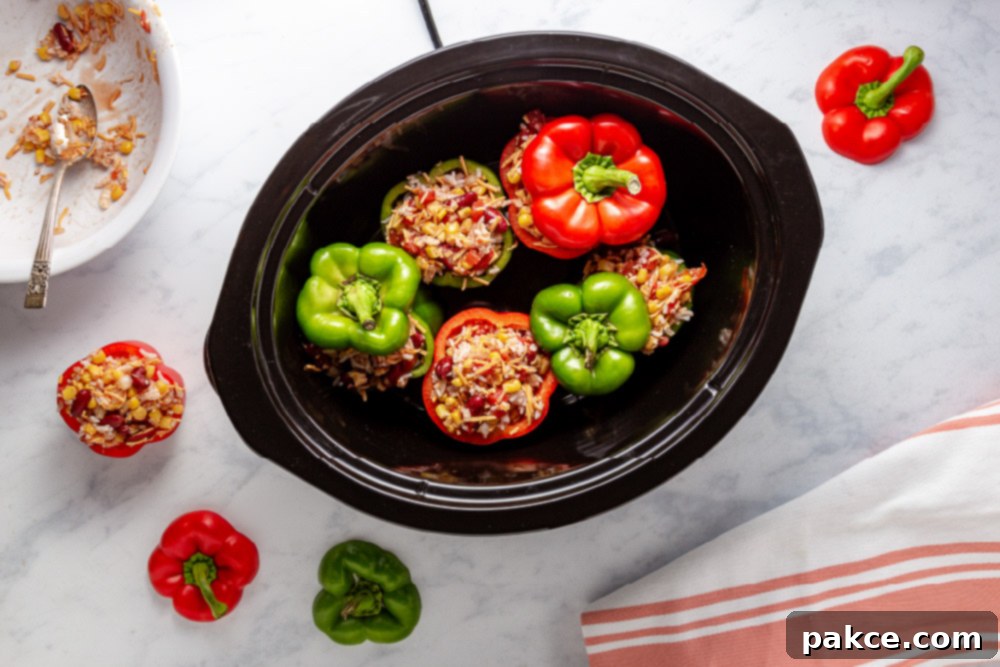 Zesty Cheesy Southwestern Stuffed Peppers 6 Easy Slow Cooker Southwestern Stuffed Peppers with Cheese in slow cooker before cooking