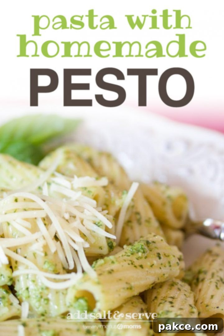 Pasta with Homemade Pesto Rigatoni on a white plate topped with shredded parmesan cheese and pesto. Text Pasta with Homemade Pesto Add Salt & Serve formerly menus4moms