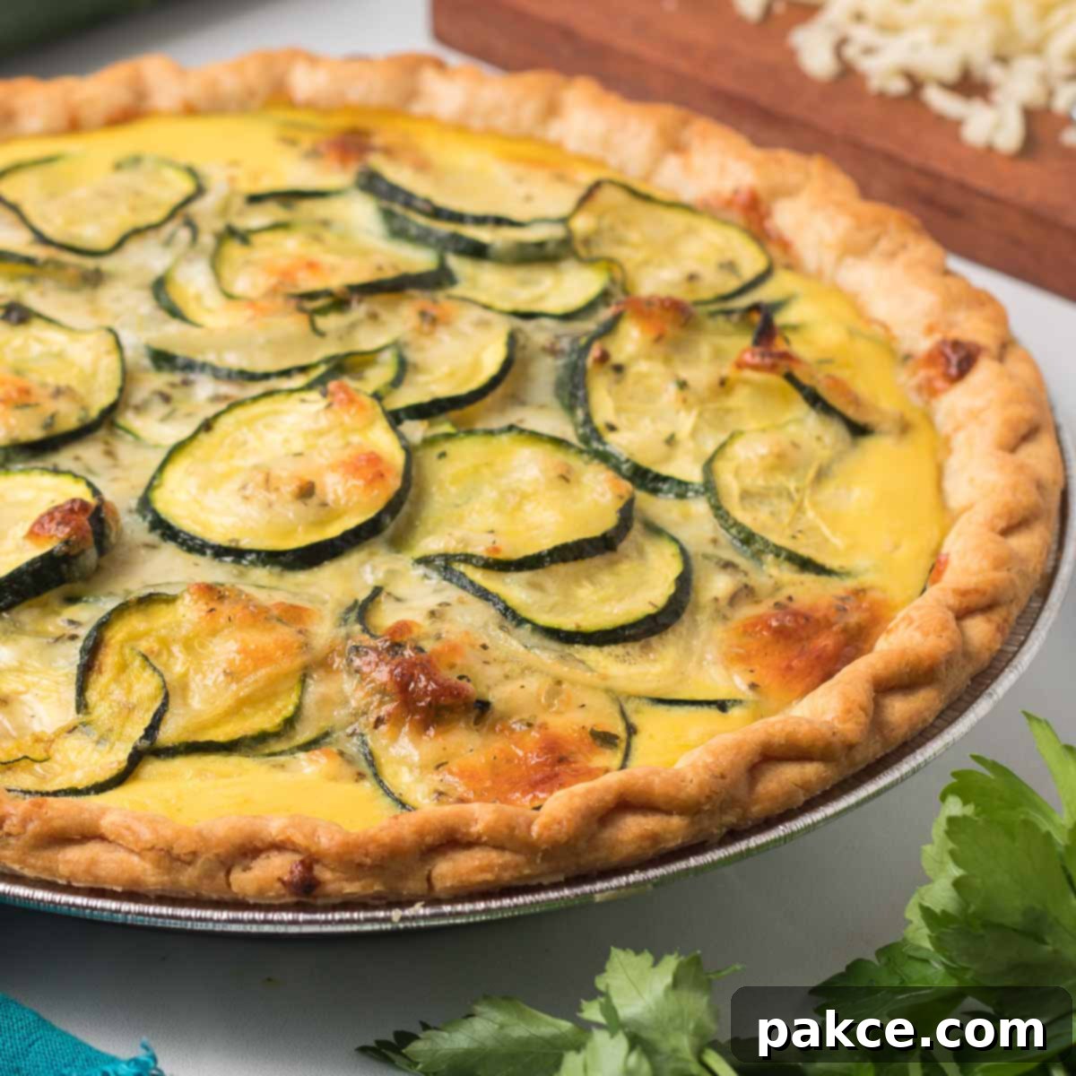 Baked zucchini quiche, golden brown and perfectly set, ready to be served.