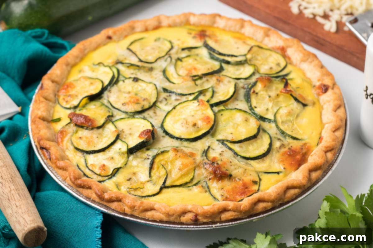 Golden Zucchini Cheese Quiche 7 Freshly baked zucchini quiche, golden and bubbly, straight from the oven.